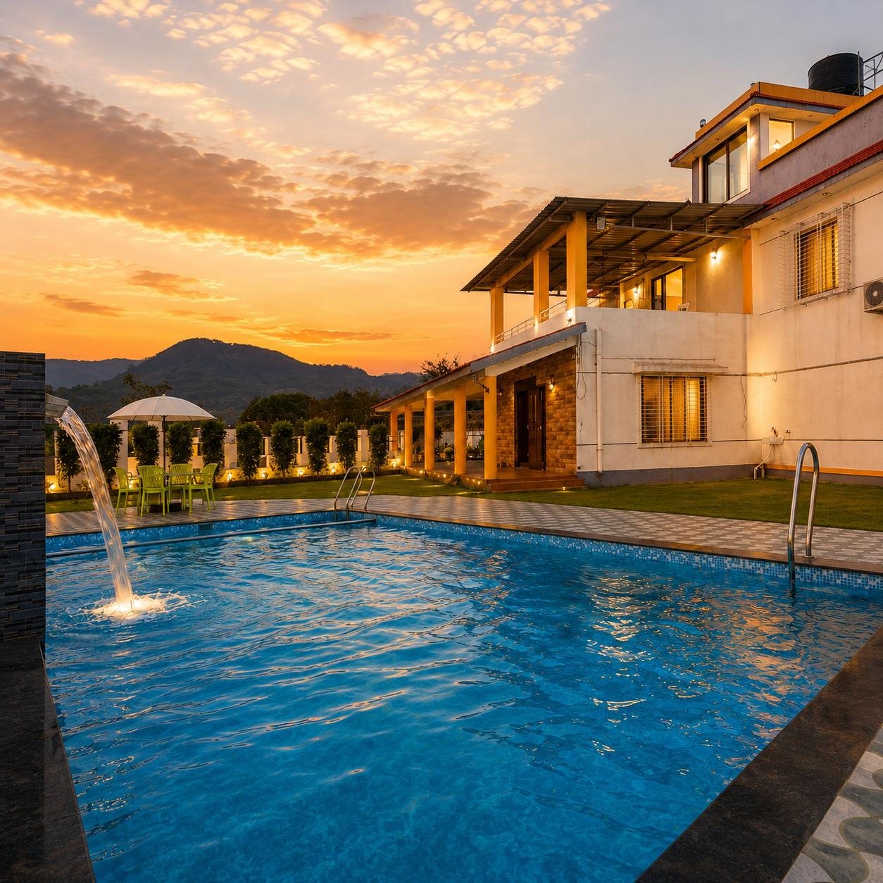 The Morning Glory pool and villa at sunset